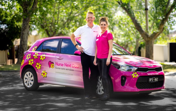 CEO & COO of Nurse Next Door with their car