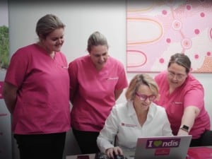 Fiona - Nurse Next Door Brisbane Franchise Partner in her office with care team