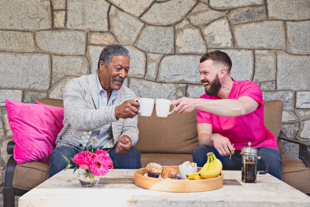 Caregiver having breakfast with client